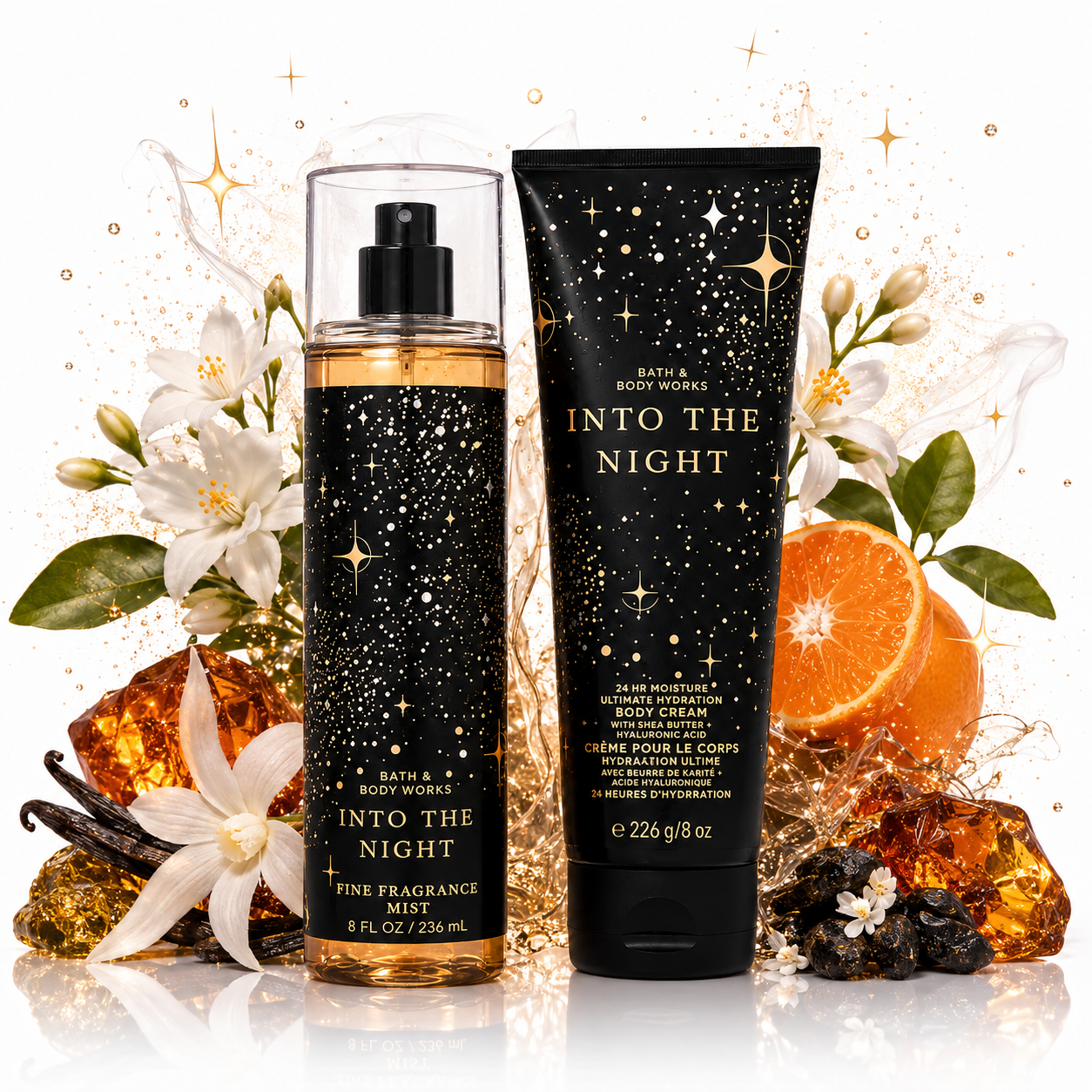 Bath & Body Works Into the Night set con body mist y crema corporal rodeados de flores de azahar, naranja, vainilla, ámbar y destellos dorados